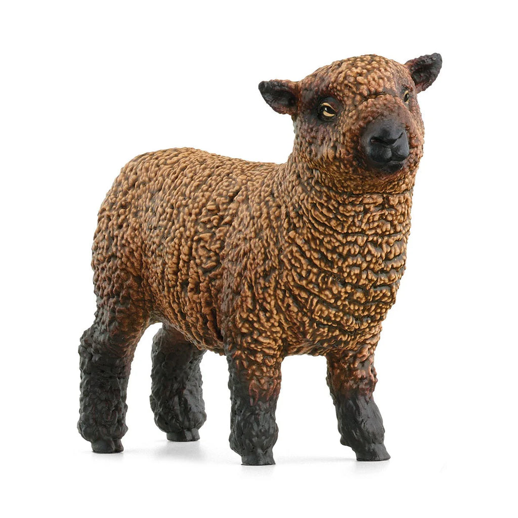 Brown sheep figurine on a white background