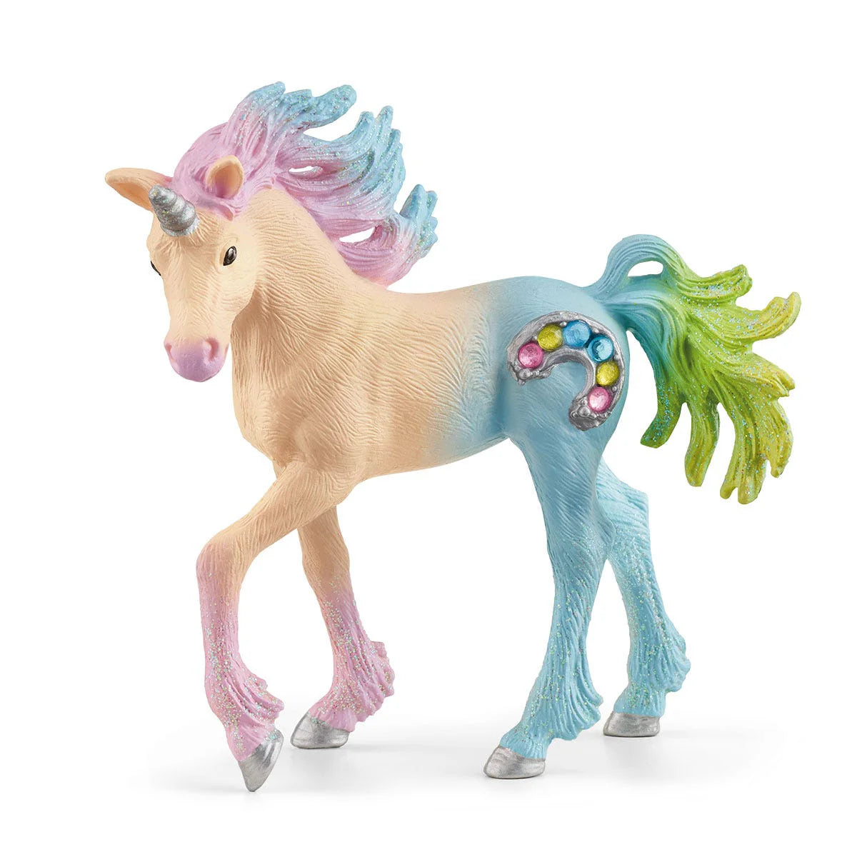 Unicorn figurine with colorful mane and tail on a white background
