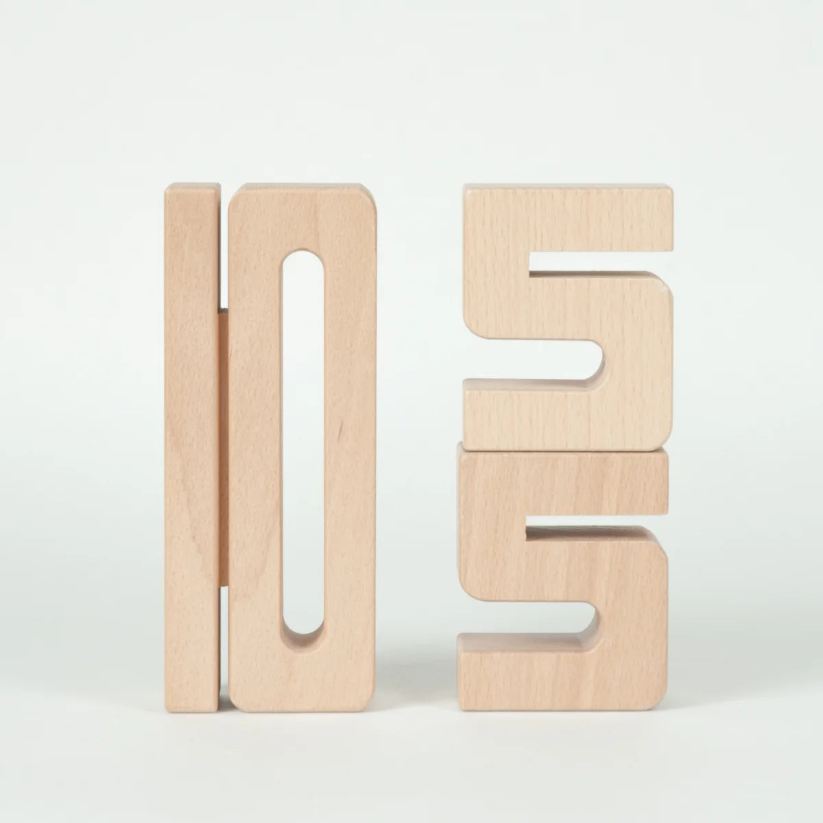 Wooden number blocks on a white background