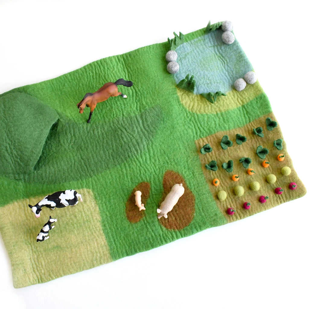 Play mat with farm animals and vegetables on a white background