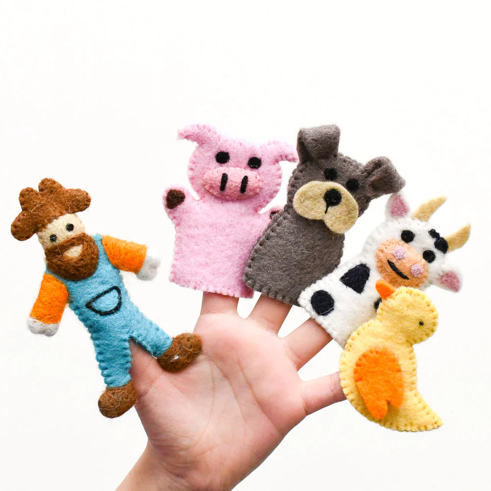 Set of colorful felt animal finger puppets on a hand against a white background