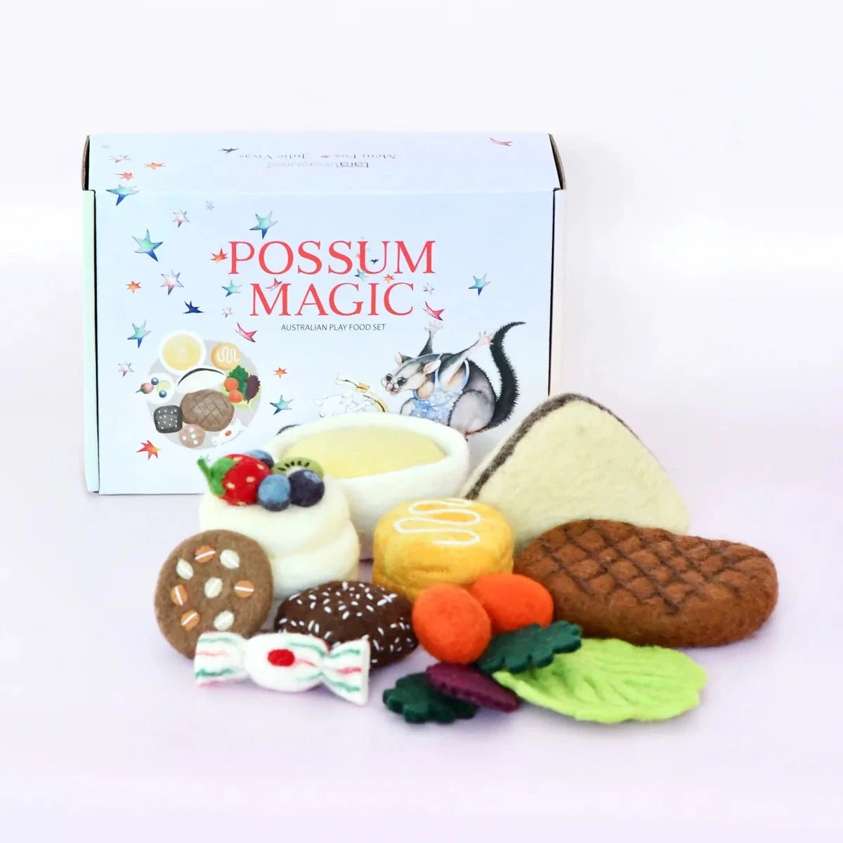 A Possum Magic children's food play set featuring felt toys shaped like various foods, arranged in front of their illustrated product box on a clean white background.