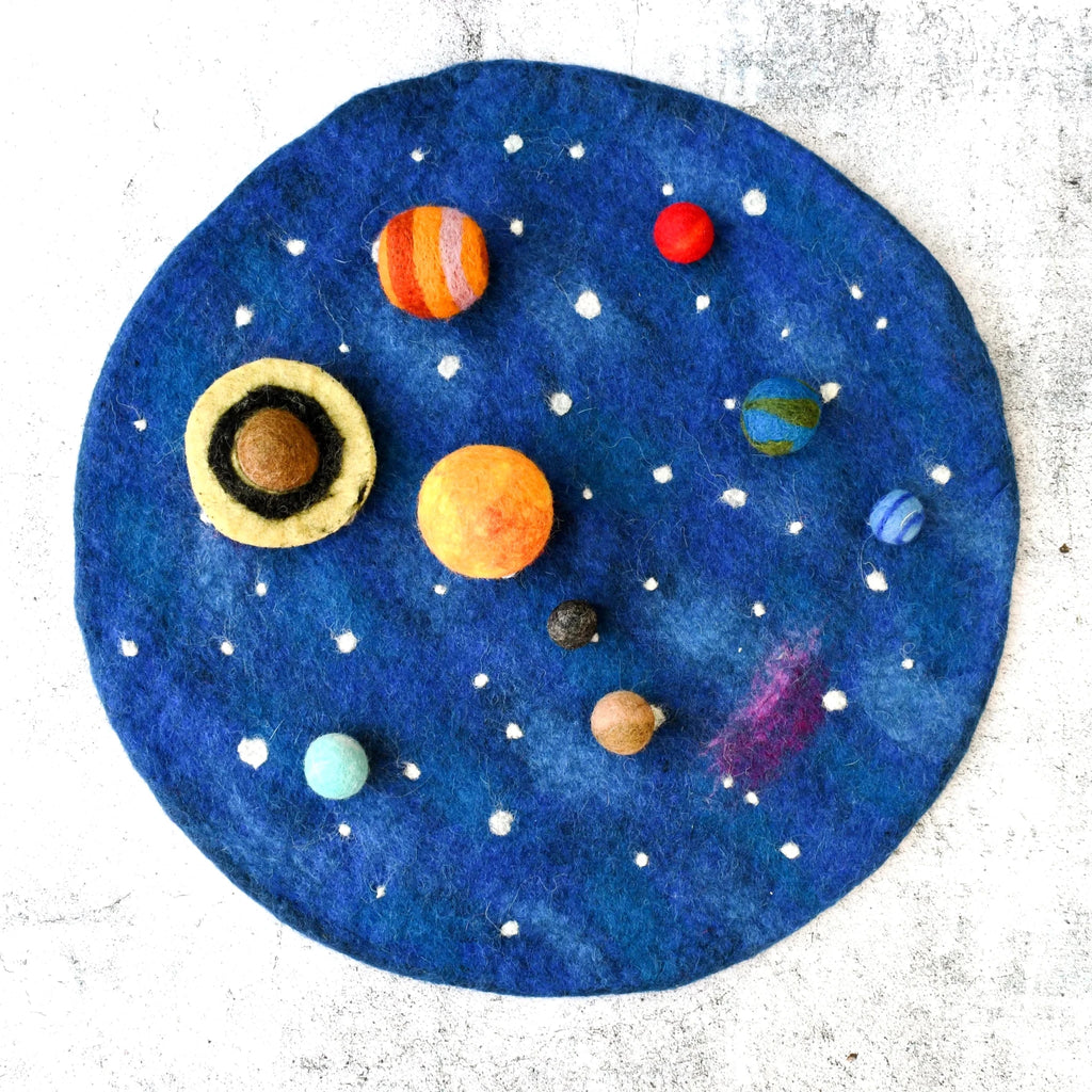 Felt solar system model on a blue background with planets in various colors.