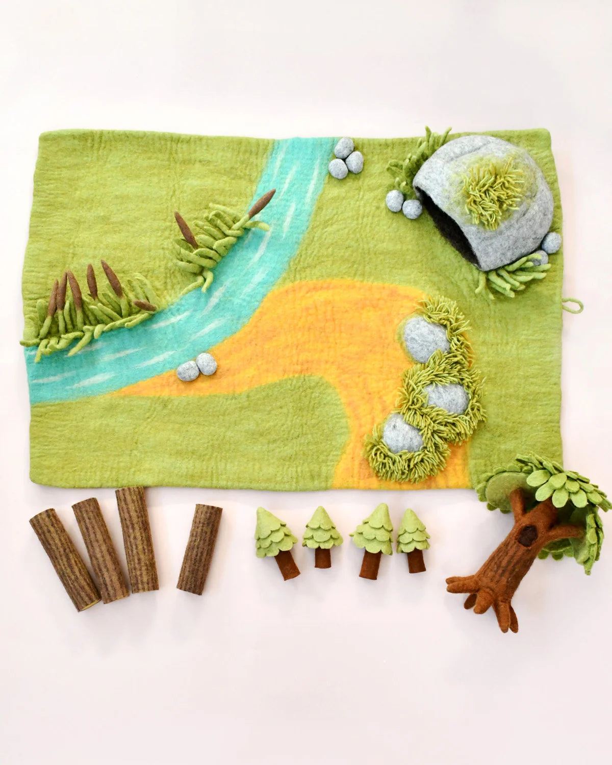 Felt play mat with nature-themed elements on a white background