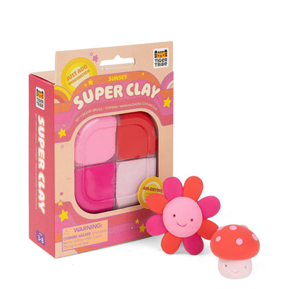 Super Clay packaging with a flower and mushroom toy on a white background