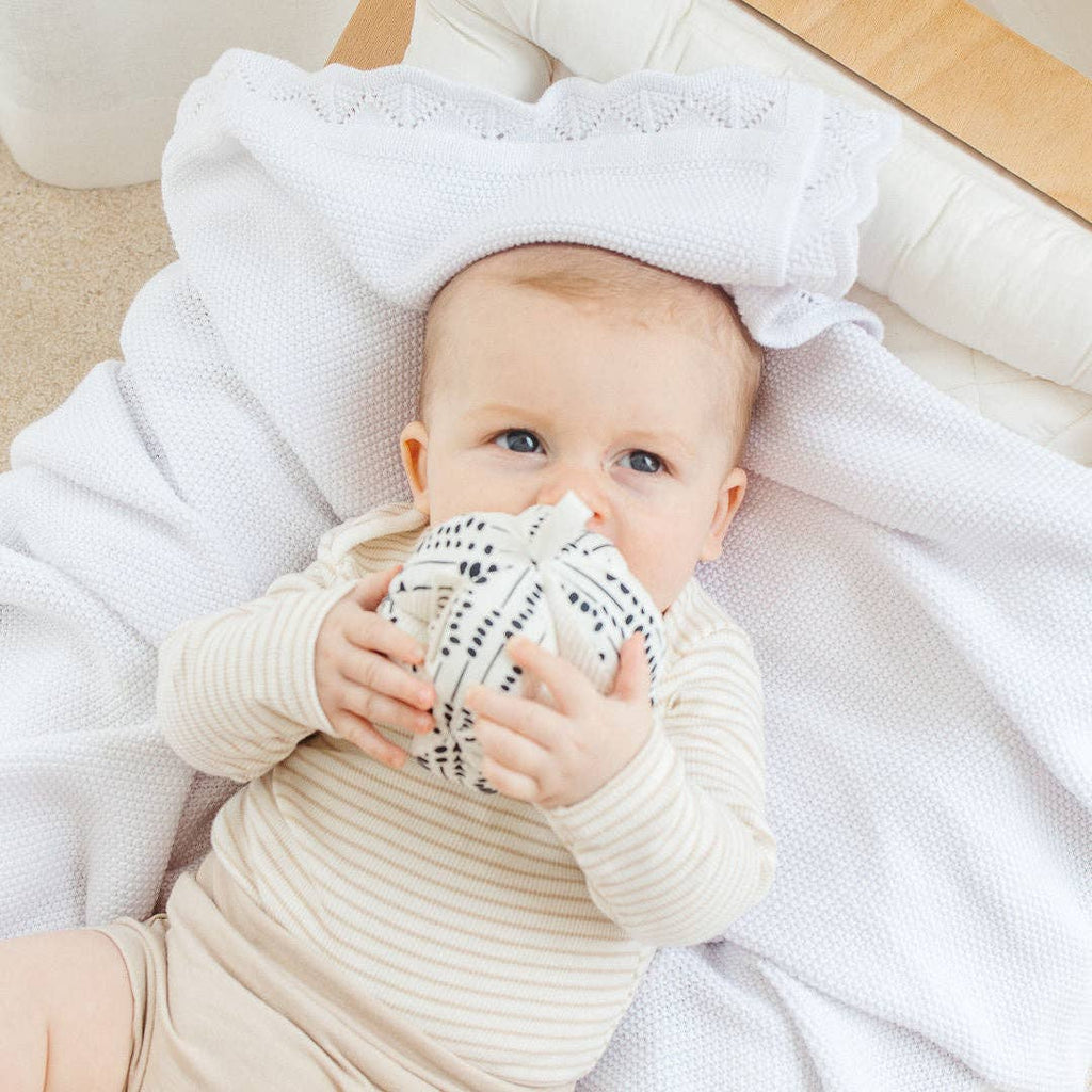 Baby playing with Totli - Organic Sensory Ball