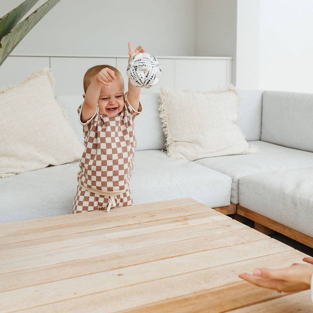 Child playing with Totli - Organic Sensory Ball