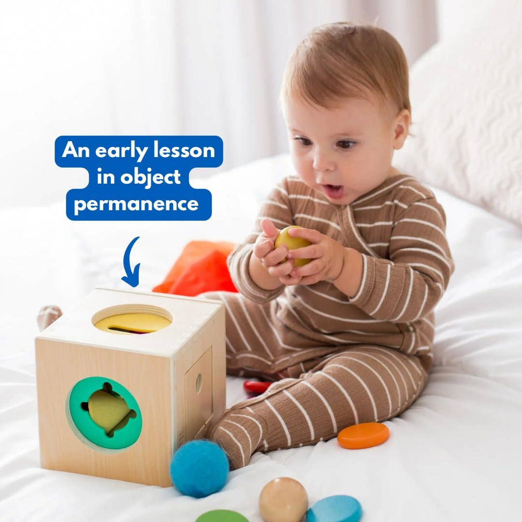 Baby playing with Totli Box