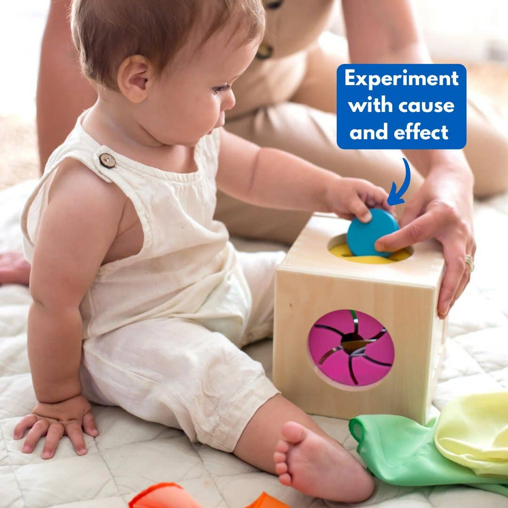 Baby playing with Totli Box