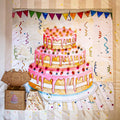 Colorful cake illustration with pink icing and confetti on a decorative background