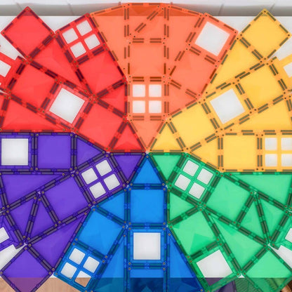 Colorful magnetic building blocks arranged in a circular pattern.